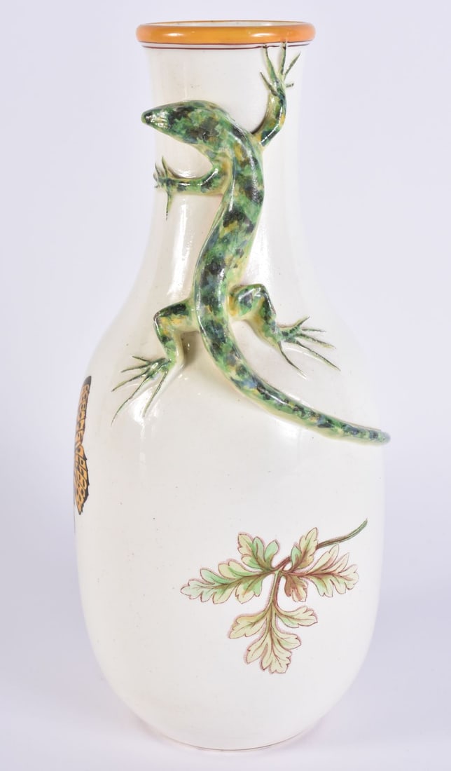 A RARE WEDGWOOD AESTHETIC MOVEMENT LIZARD VASE decorated with insects and foliage. 23.5 cm high. (1 of 5)