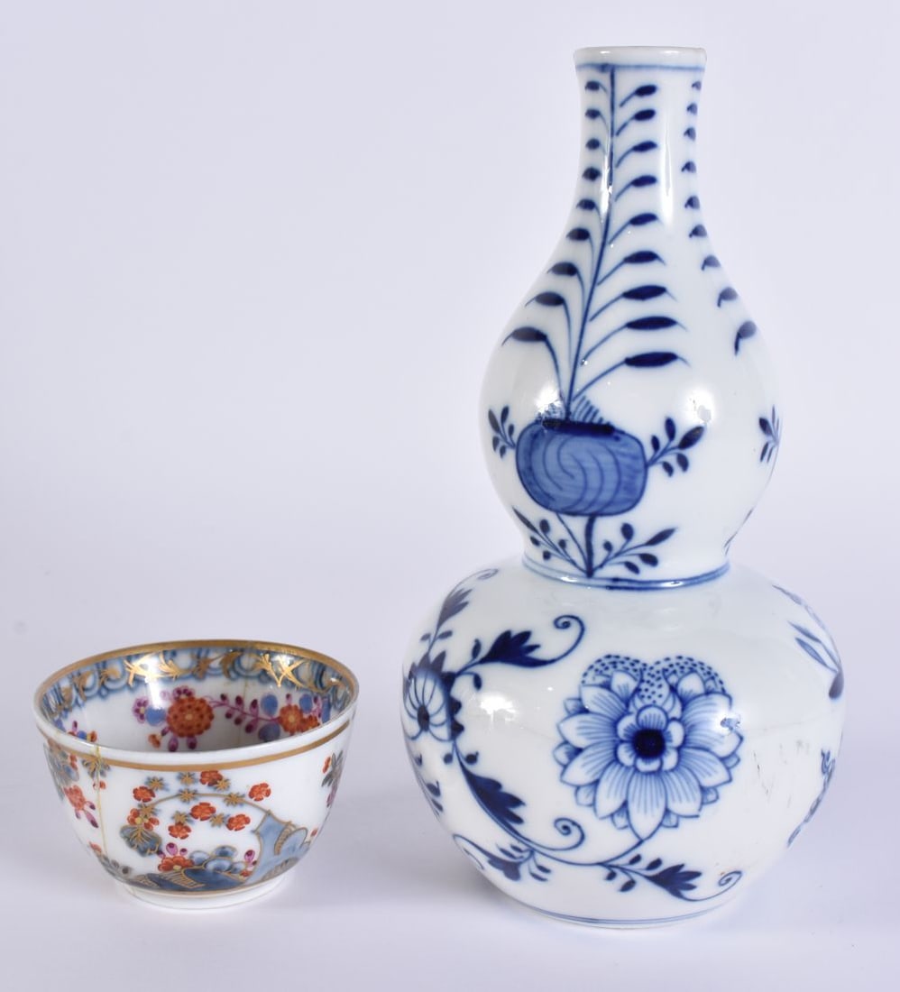 A 19TH CENTURY MEISSEN BLUE AND WHITE PORCELAIN GOURD VASE together with a Meissen teabowl. Largest (1 of 9)