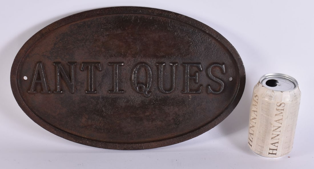 A VINTAGE CAST IRON ANTIQUES SIGN. 34 cm x 21 cm. (1 of 3)