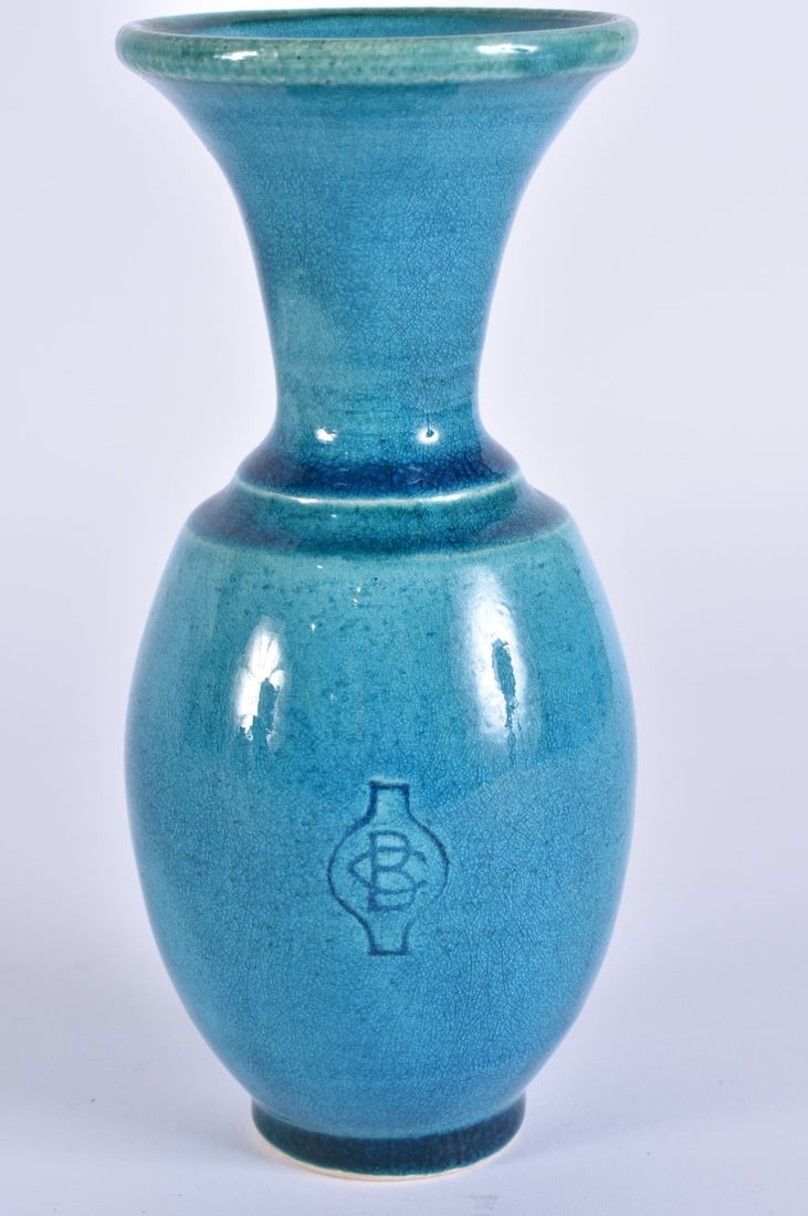 AN UNUSUAL TURQUOISE GLAZED STUDIO POTTERY VASE signed CB within a vase. 15 cm high.: AN UNUSUAL TURQUOISE GLAZED STUDIO POTTERY VASE signed CB within a vase. 15 cm high.