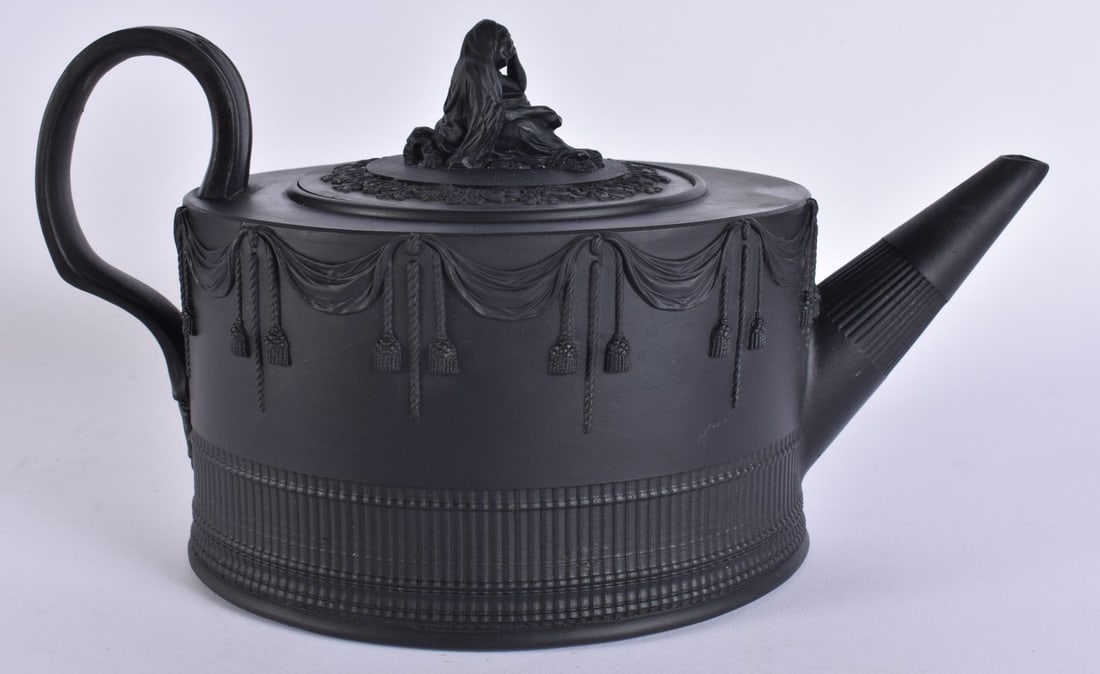 A MID 19TH CENTURY ENGLISH BLACK BASALT TEAPOT AND COVER overlaid with swags. 23 cm wide. (1 of 7)