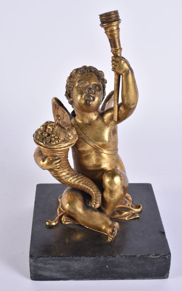 A LOVELY 18TH/19TH CENTURY EUROPEAN GILT BRONZE INKWELL formed as a seated putti holding aloft a ves (1 of 14)