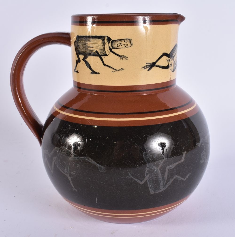 AN UNUSUAL BROWNFIELD POTTERY JUG decorated with fantastical figures. 16 cm x 14 cm.: AN UNUSUAL BROWNFIELD POTTERY JUG decorated with fantastical figures. 16 cm x 14 cm.