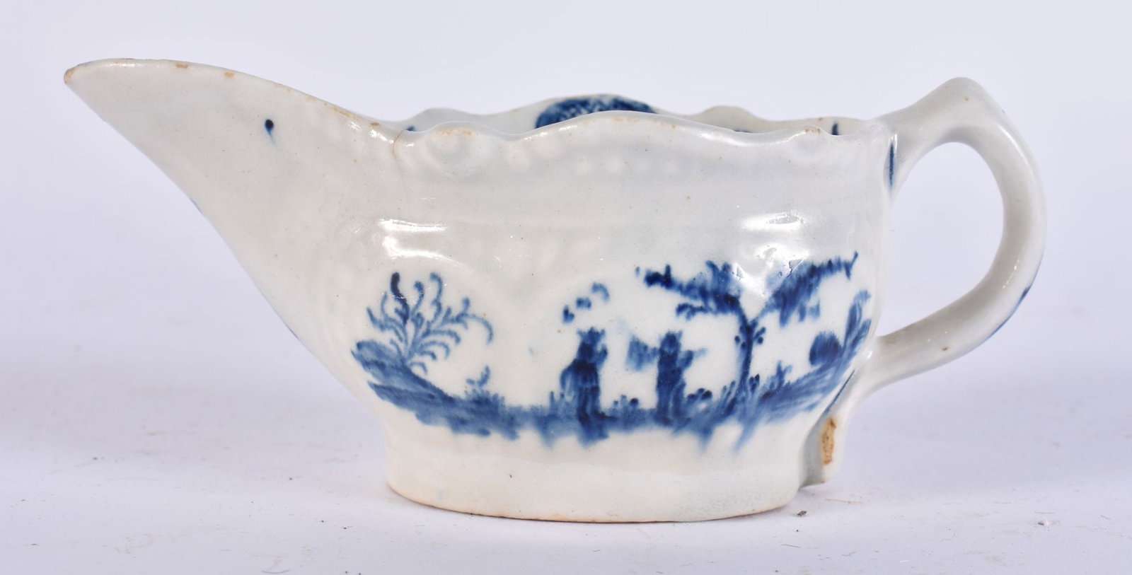 AN 18TH CENTURY LOWESTOFT BLUE AND WHITE PORCELAIN CREAMBOAT. 10.5 cm wide. (1 of 4)