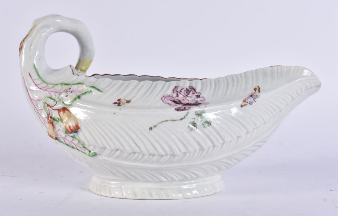 AN 18TH CENTURY WORCESTER SAUCEBOAT painted with insects and foliage. 18 cm wide.: AN 18TH CENTURY WORCESTER SAUCEBOAT painted with insects and foliage. 18 cm wide.