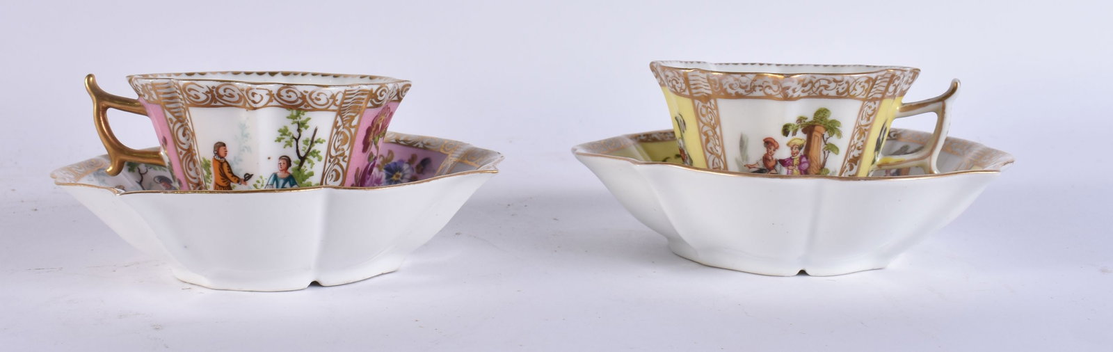 A PAIR OF AUGUSTUS REX DRESDEN PORCELAIN CUPS AND SAUCERS. 13 cm wide. (4): A PAIR OF AUGUSTUS REX DRESDEN PORCELAIN CUPS AND SAUCERS. 13 cm wide. (4)