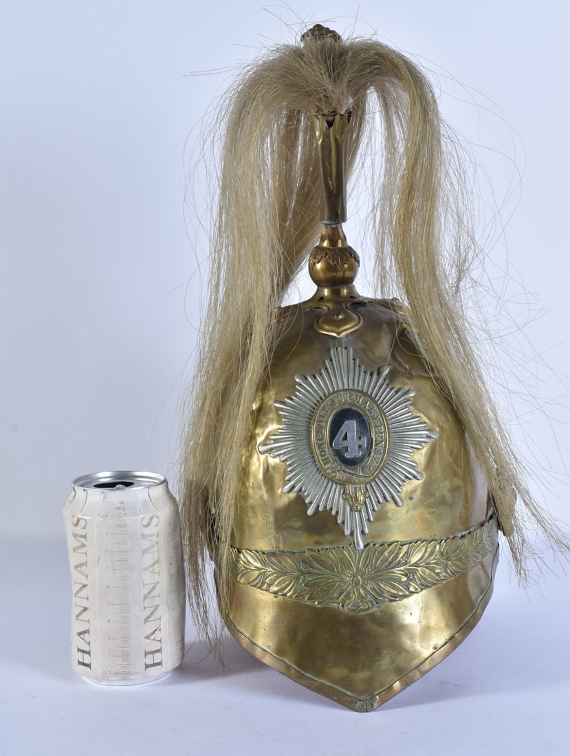 A 19TH CENTURY 4TH ROYAL IRISH DRAGOON GUARDS BRASS HELMET with white plume. 37 cm high. (1 of 5)