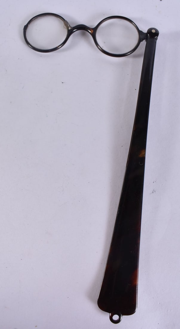 A PAIR OF TORTOISESHELL LORGNETTES. 33 cm long. (1 of 1)