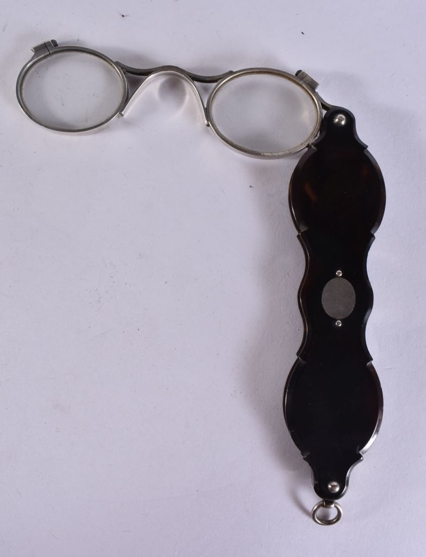 A PAIR OF TORTOISESHELL SILVER MOUNTED LORGNETTES. 12 cm x 9.5 cm. (1 of 1)
