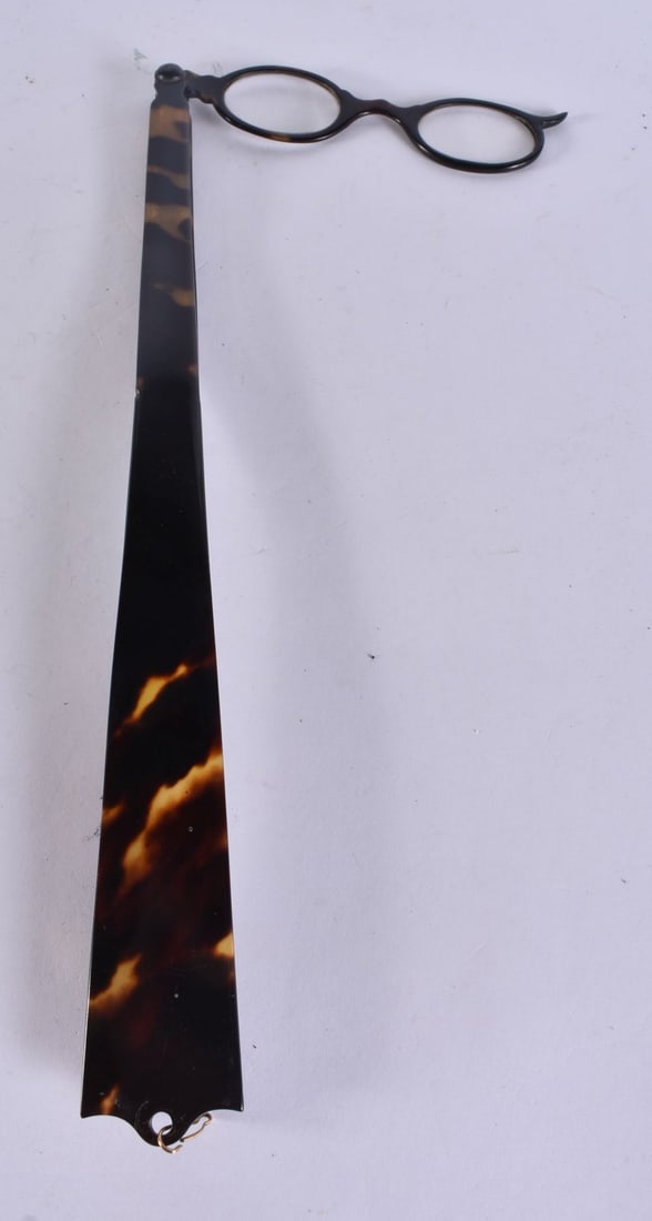 A PAIR OF TORTOISESHELL LORGNETTES. 37 cm long. (1 of 1)