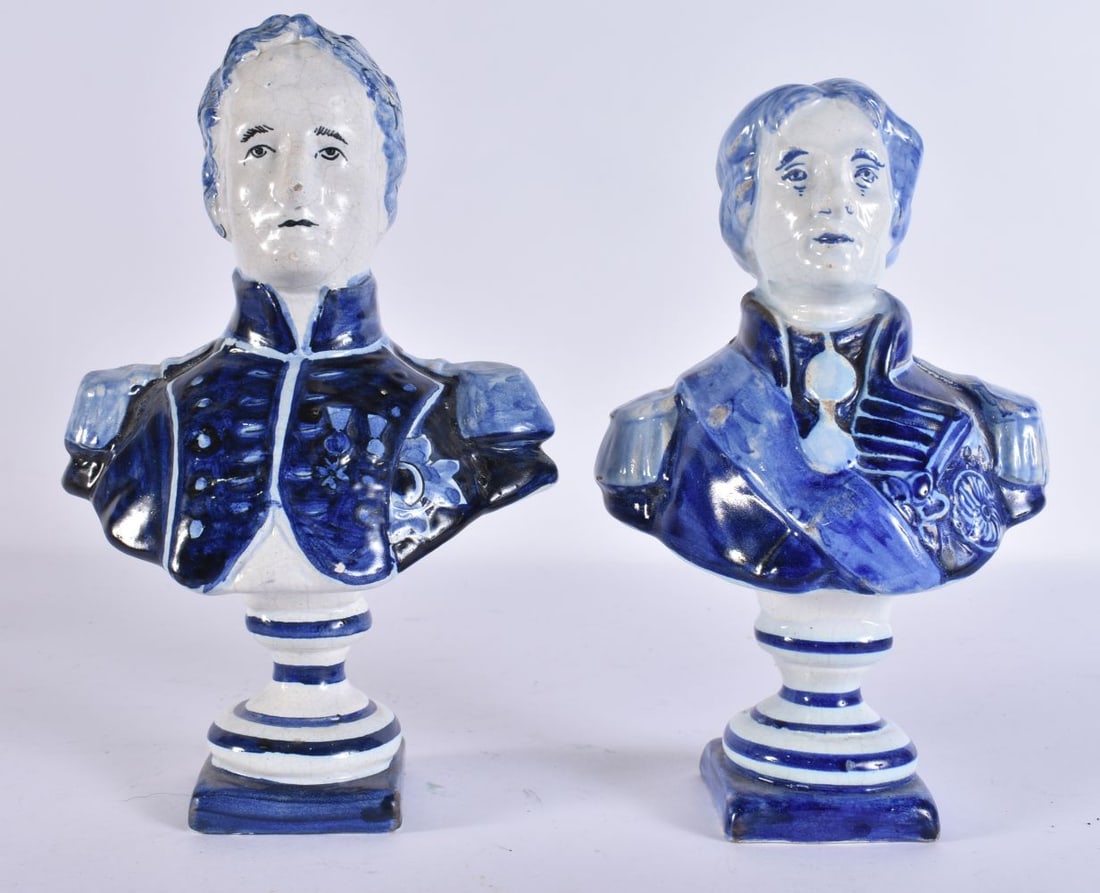 A RARE PAIR OF ANTIQUE DELFT BLUE AND WHITE POTTERY BUSTS. 19 cm high.: A RARE PAIR OF ANTIQUE DELFT BLUE AND WHITE POTTERY BUSTS. 19 cm high.
