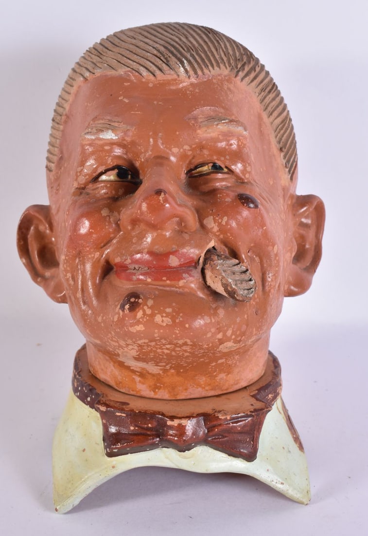 A RARE EARLY 20TH CENTURY PAINTED POTTERY CRESS GROWING HEAD. 22 cm x 12 cm. (1 of 5)