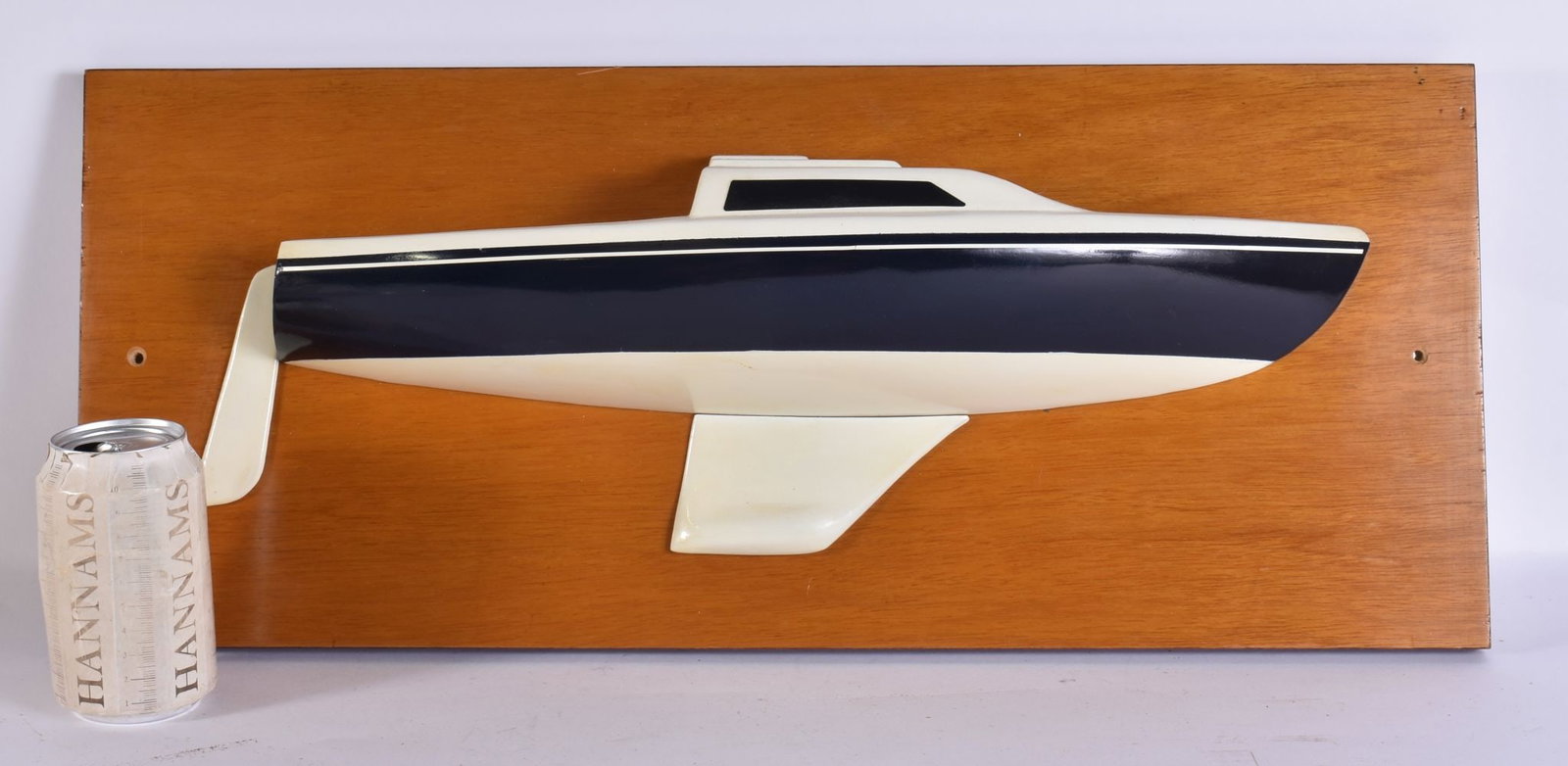 A MID CENTURY FIBRE GLASS HALF HULL SHIPS MODEL. 62 cm x 28 cm. (1 of 3)