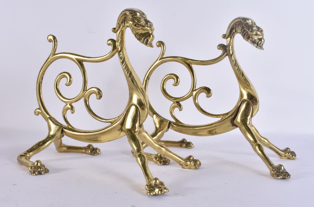 A PAIR OF ARTS AND CRAFTS BRONZE ANDIRONS formed as beasts. 22 cm x 22 cm.: A PAIR OF ARTS AND CRAFTS BRONZE ANDIRONS formed as beasts. 22 cm x 22 cm.