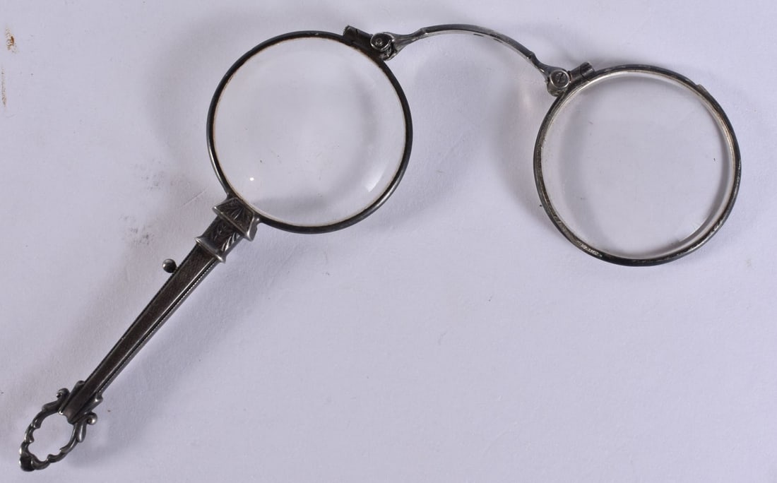 A PAIR OF SILVER LORGNETTES. 16 cm extended. (1 of 3)