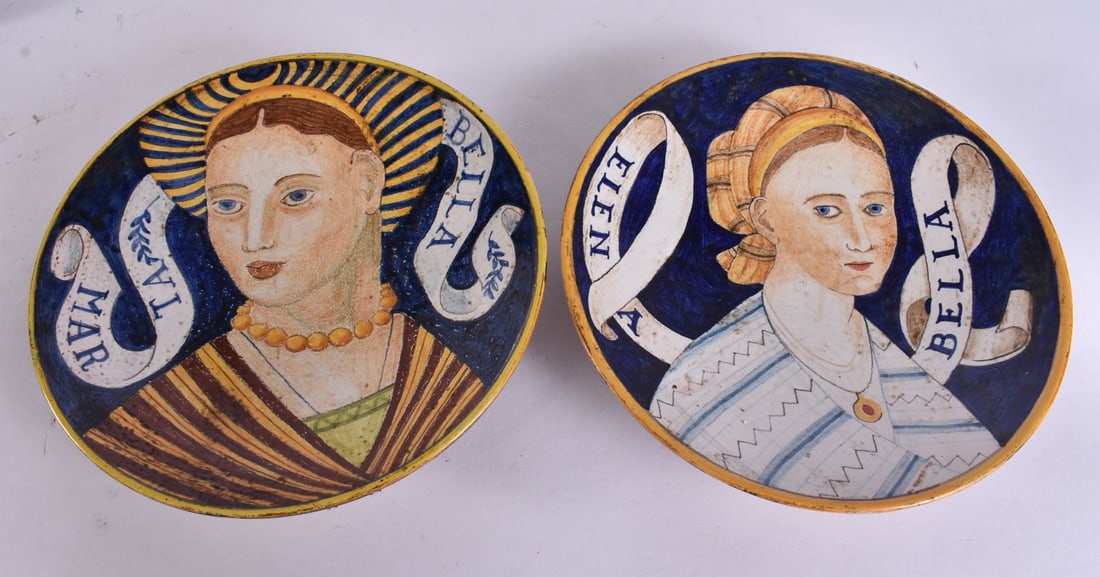 A PAIR OF ANTIQUE MAJOLICA FAIENCE POTTERY DISHES painted with portraits. 19 cm wide.: A PAIR OF ANTIQUE MAJOLICA FAIENCE POTTERY DISHES painted with portraits. 19 cm wide.