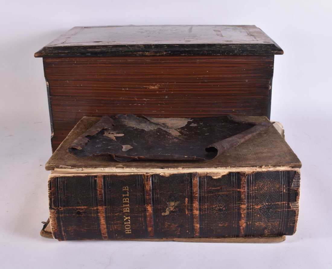 AN ANTIQUE MUSIC BOX and a copy of the bible. Largest 40 cm wide. (2) (1 of 4)