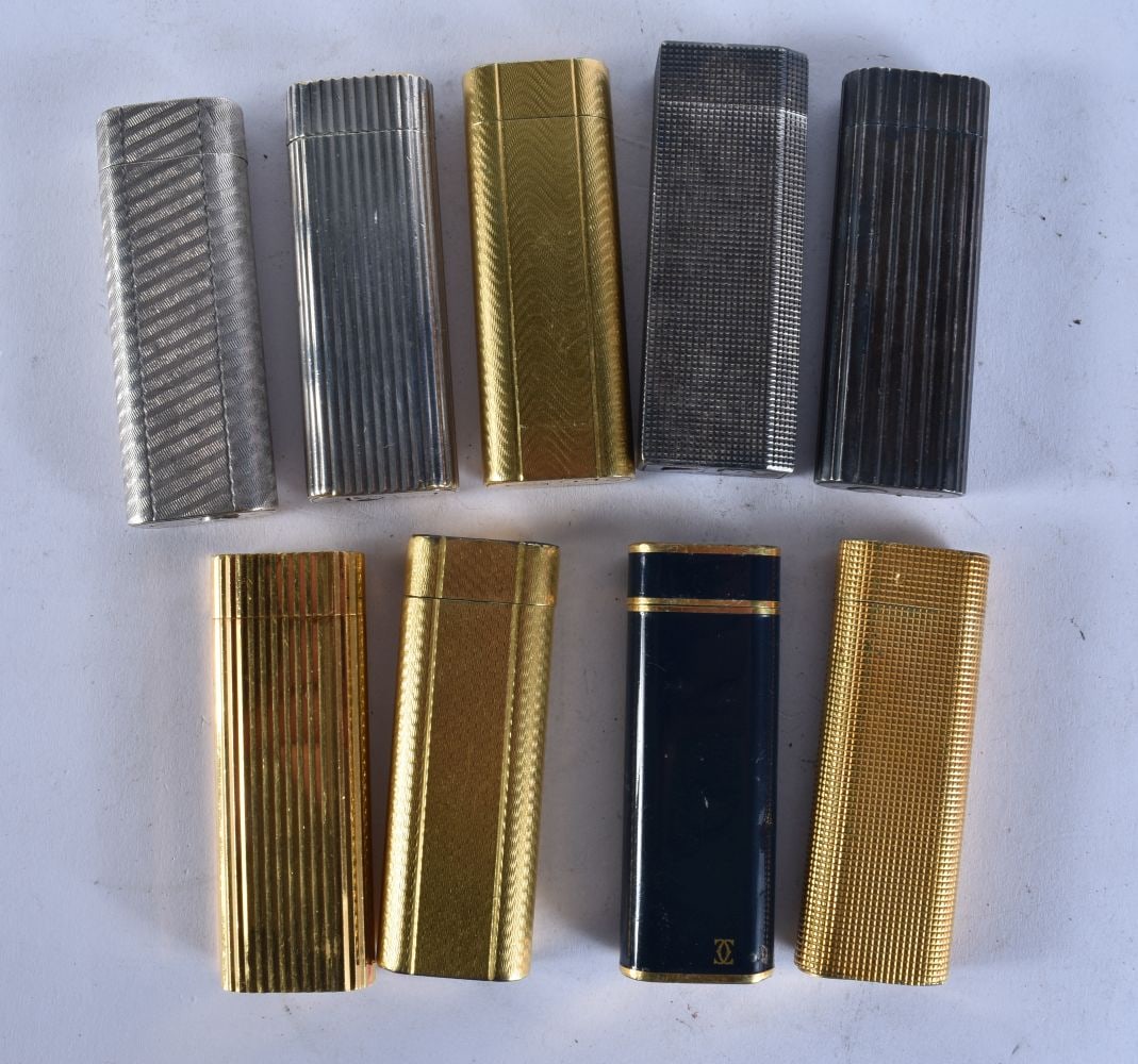 NINE CARTIER LIGHTERS. (9) (1 of 4)