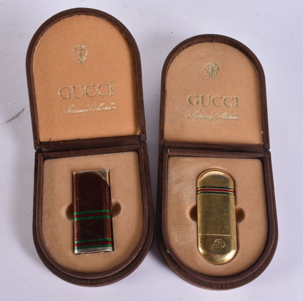 TWO BOXED GUCCI LIGHTERS. (2) (1 of 4)