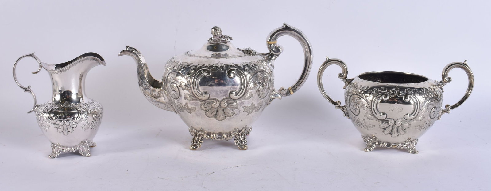 A SILVER PLATED TEASET. Largest 20 cm wide. (3) (1 of 6)