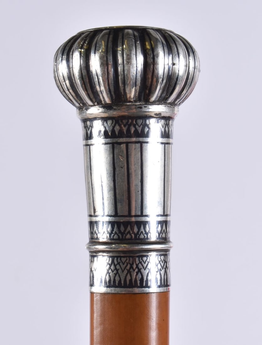 AN ANTIQUE SILVER NIELLO MOUNTED MALACCA WALKING CANE. 92 cm long. (1 of 4)
