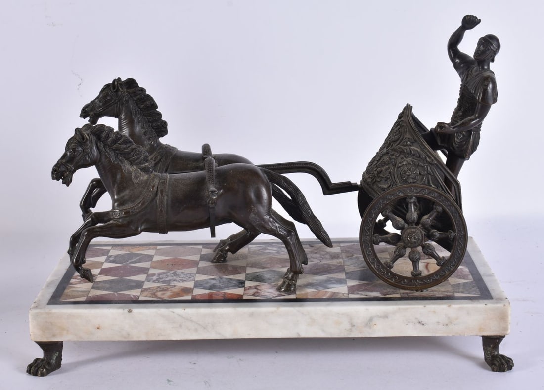 A 19TH CENTURY EUROPEAN GRAND TOUR BRONZE AND MIXED HARDSTONE FIGURE modelled as a male upon a chari: A 19TH CENTURY EUROPEAN GRAND TOUR BRONZE AND MIXED HARDSTONE FIGURE modelled as a male upon a chariot, being drawn by horses. 32 cm x 24 cm.