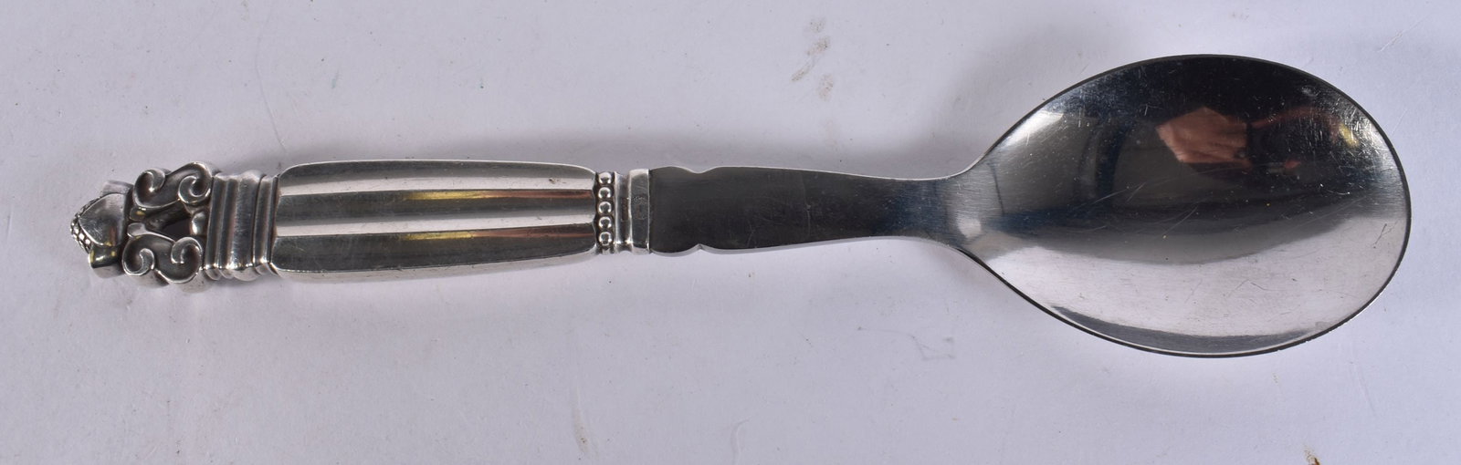 A GEORG JENSEN SILVER SPOON. 71 grams. 17 cm long. (1 of 3)