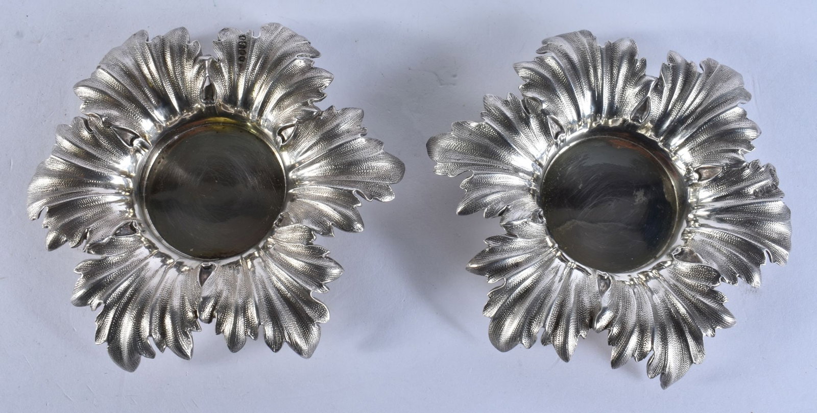 A PAIR OF VICTORIAN SILVER FOLIATE DISHES. 119 grams. 9.5 cm wide. (1 of 2)