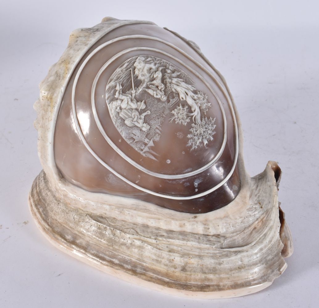 A LATE 19TH CENTURY ITALIAN CAMEO CARVED CONCH SHELL of helmet shell form with an oval reserve finel (1 of 5)