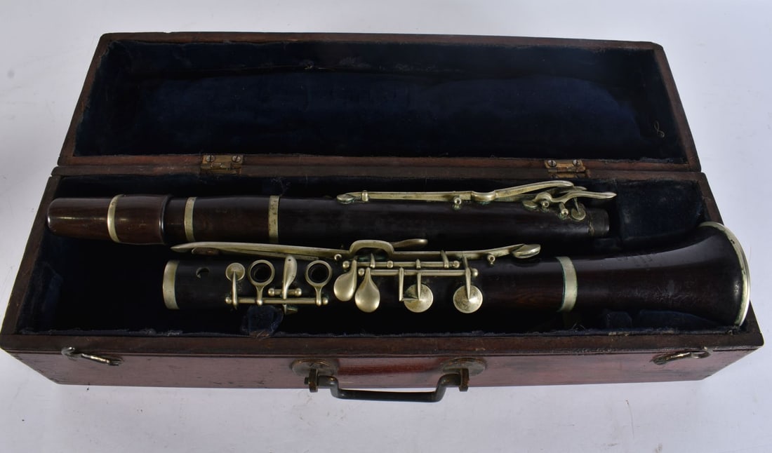 A BOXED VICTORIAN MUSICAL INSTRUMENT. Box 43 cm wide. (1 of 5)