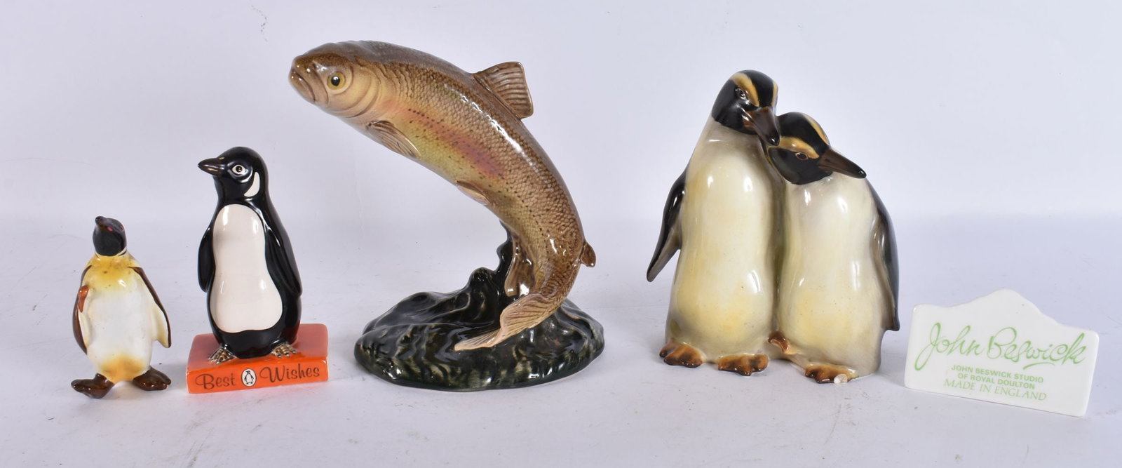 TWO RARE ROYAL DOULTON PENGUINS together with a Beswick fish etc. Largest 17 cm high. (5): TWO RARE ROYAL DOULTON PENGUINS together with a Beswick fish etc. Largest 17 cm high. (5)