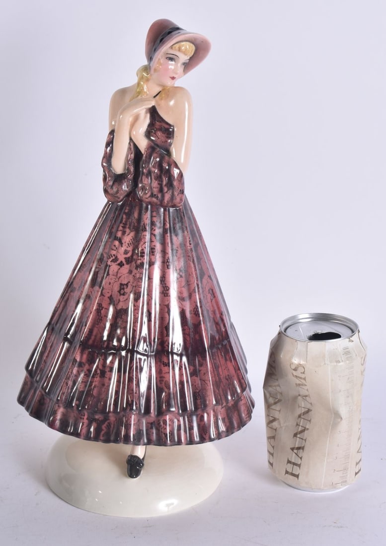AN ART DECO AUSTRIAN GOLDSCHEIDER FIGURE OF A FEMALE. 32 cm high. (1 of 5)