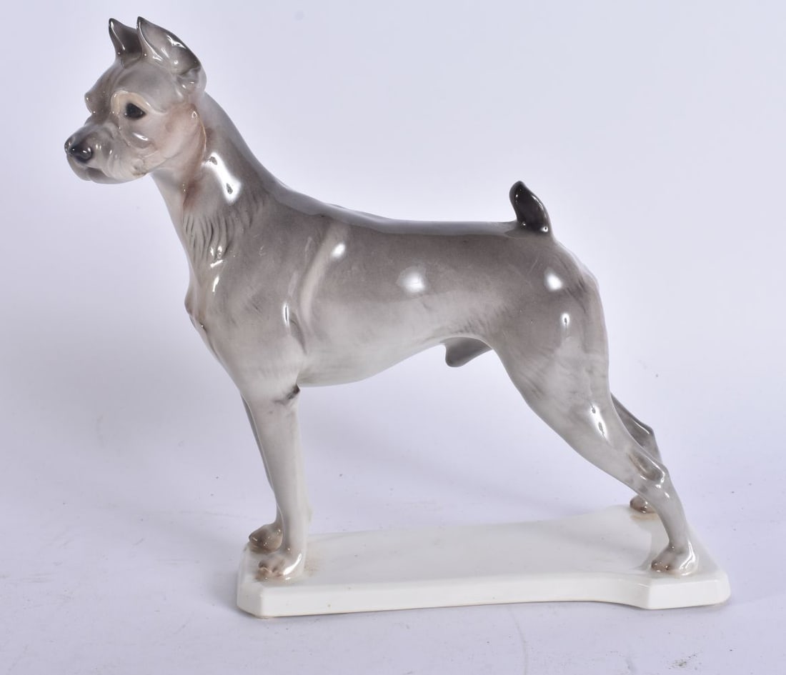 A GERMAN NYMPHENBURG FIGURE OF A DOG. 19 cm x 17 cm. (1 of 5)