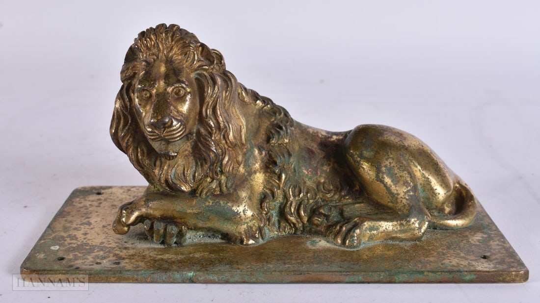 A 19TH CENTURY EUROPEAN GILT BRONZE FIGURE OF A LION. 15 cm x 8 cm. (1 of 6)