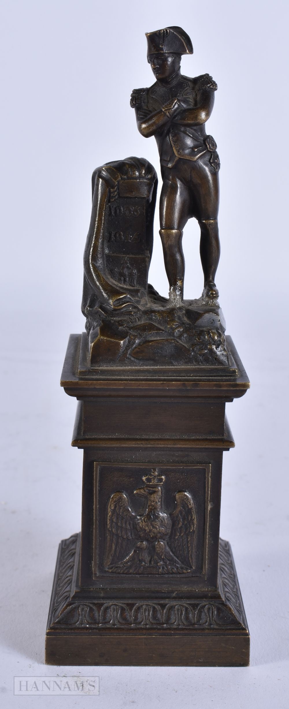 A 19TH CENTURY EUROPEAN GRAND TOUR BRONZE FIGURE OF NAPOLEON modelled upon a column. 16 cm high. (1 of 6)