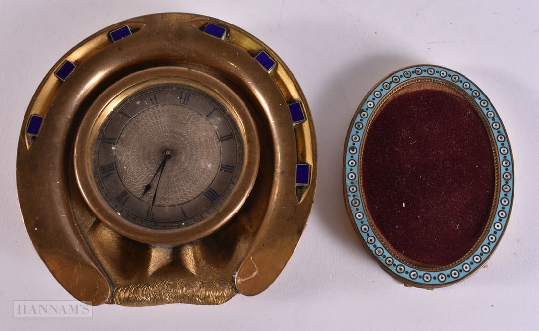 AN ANTIQUE EQUESTRIAN ENAMELLED HORSESHOE CLOCK together with an enamelled frame. Clock 13 cm x 10 c (1 of 6)