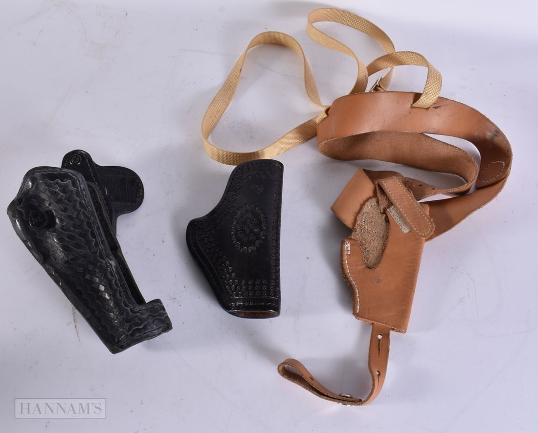THREE GUN HOLSTERS. (3) (1 of 6)