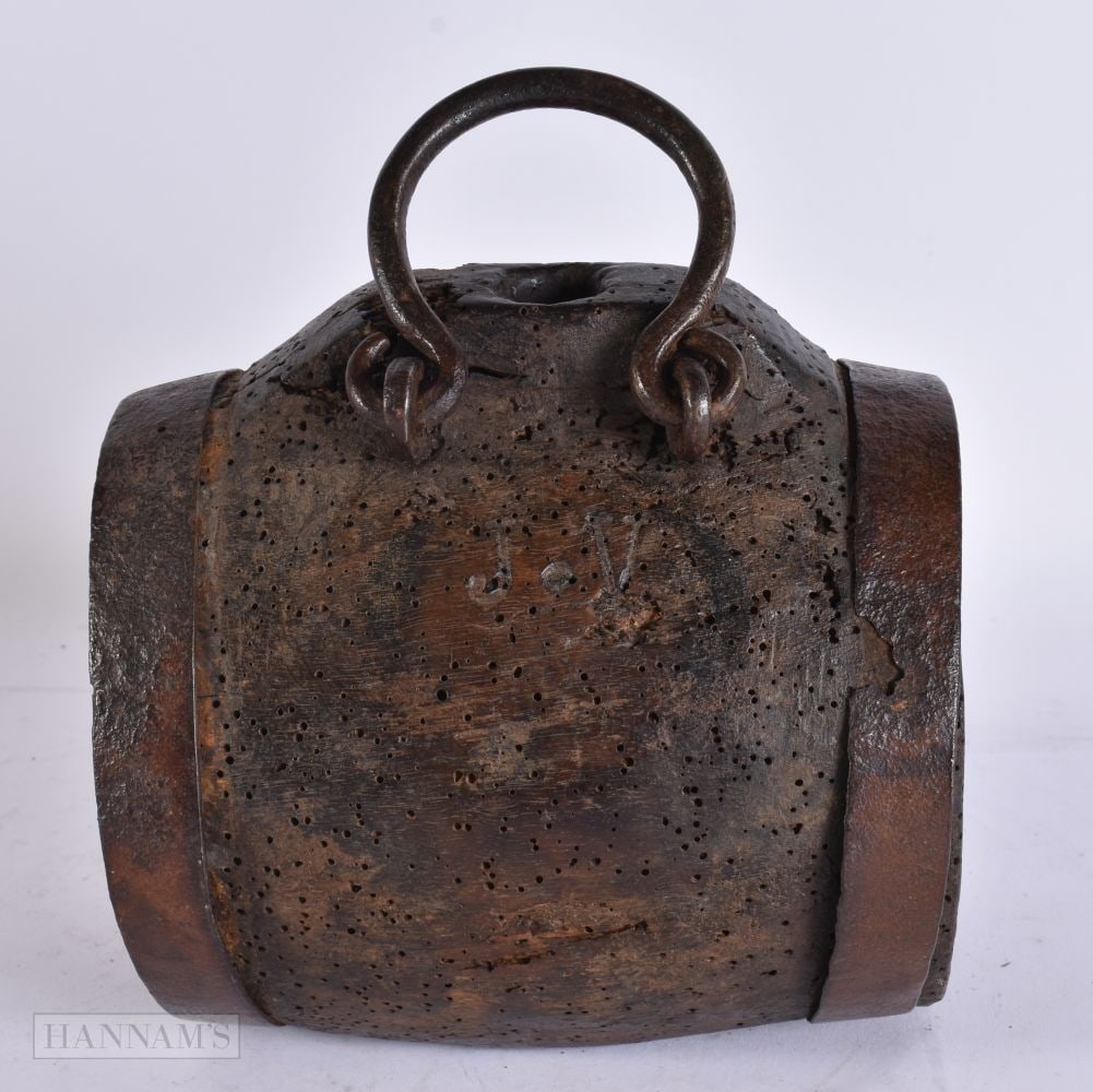 AN 18TH CENTURY CARVED WOOD POWDER OR WINE BARREL. 16 cm x 21 cm. (1 of 6)