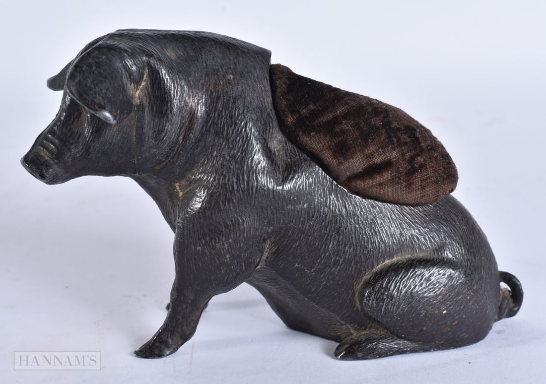 A VICTORIAN PIG PIN CUSHION. 11 cm x 8 cm.: A VICTORIAN PIG PIN CUSHION. 11 cm x 8 cm.