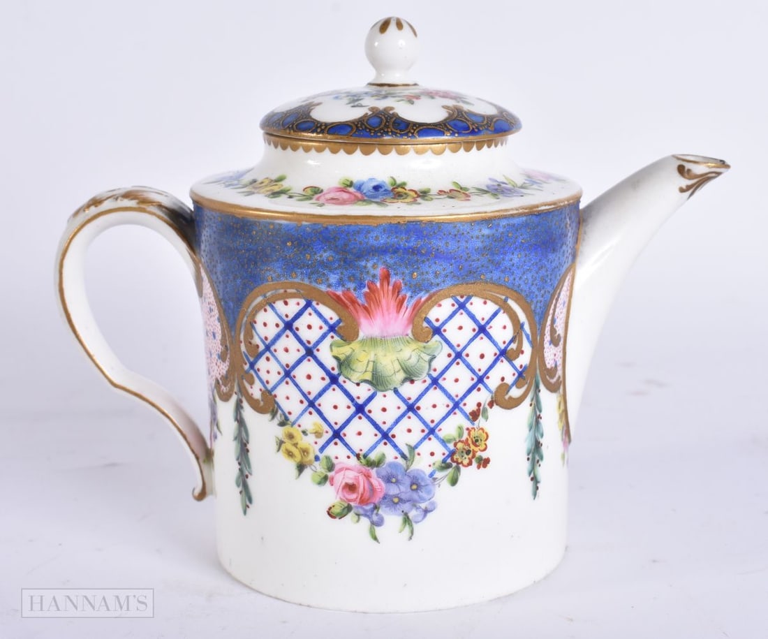 A FINE 19TH CENTURY FRENCH SEVRES PORCELAIN TEAPOT AND COVER painted with floral sprays. 13 cm wide.: A FINE 19TH CENTURY FRENCH SEVRES PORCELAIN TEAPOT AND COVER painted with floral sprays. 13 cm wide.