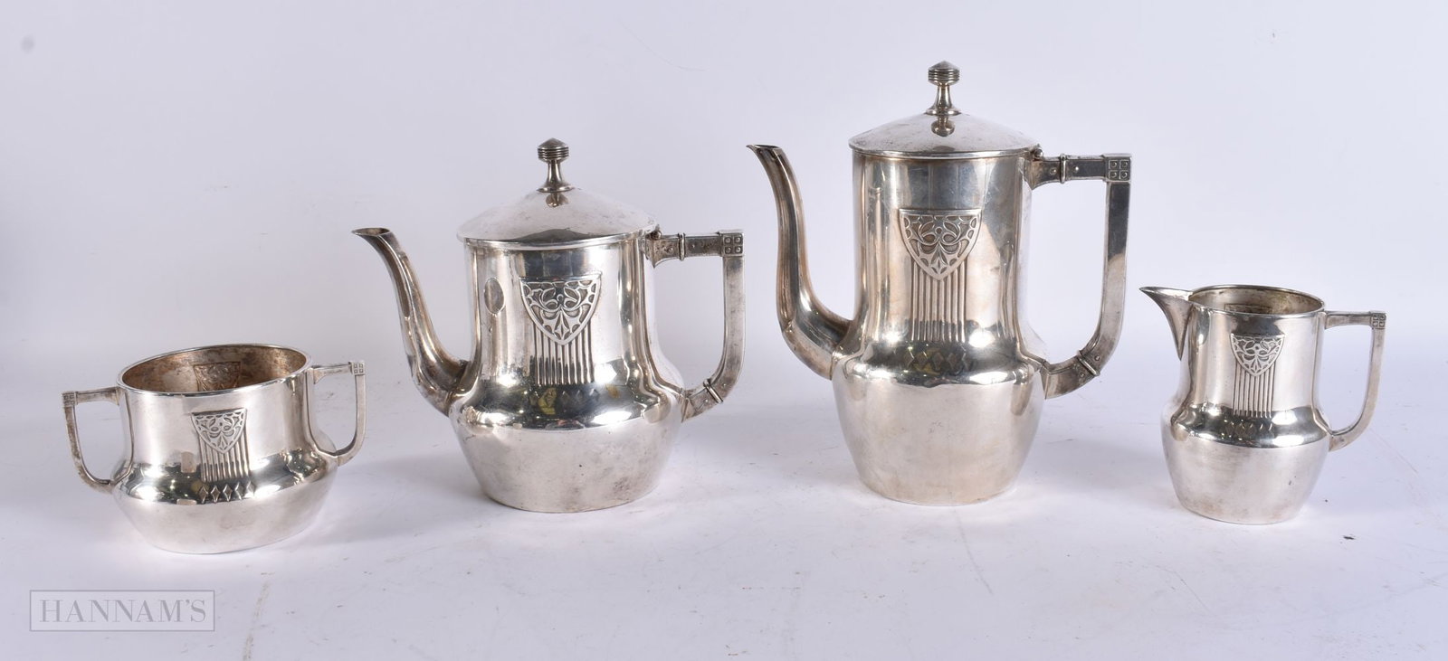 A STYLISH WMF FOUR PIECE SILVER PLATED TEASET. Largest 22 cm x 14 cm. (4) (1 of 8)