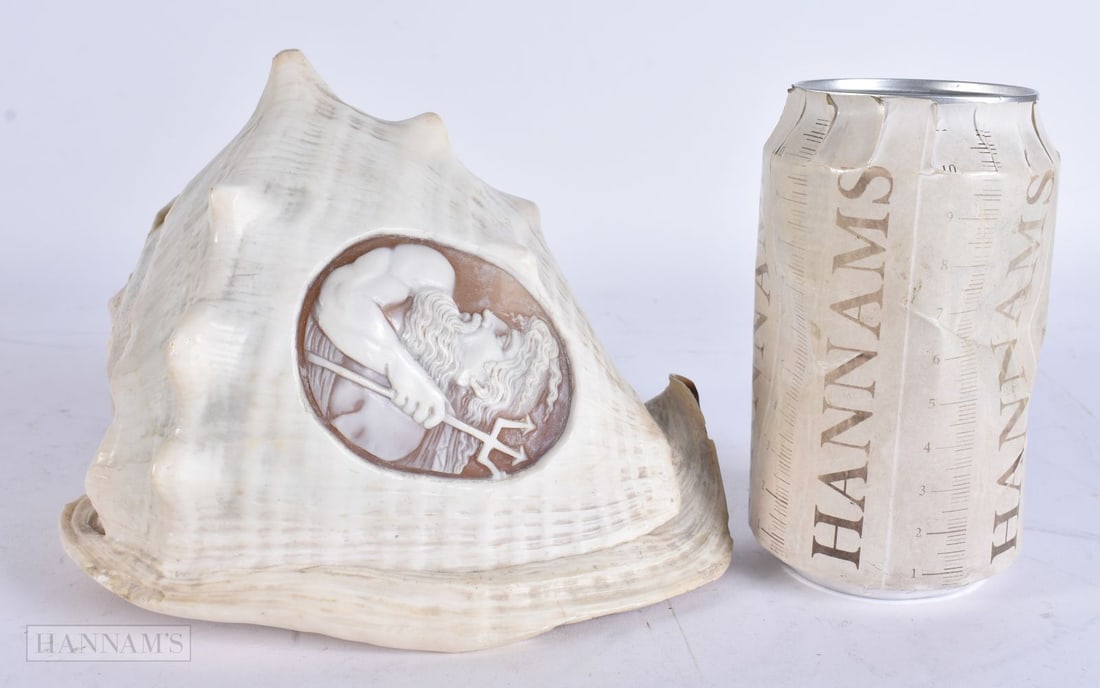 A 19TH CENTURY ITALIAN GRAND TOUR CARVED CAMEO CONCH SHELL depicting a male with trident. 15 cm x 13 (1 of 9)