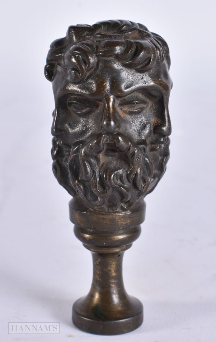 A 19TH CENTURY EUROPEAN GRAND TOUR BRONZE MULTI MASK HEAD SEAL. 8 cm high.: A 19TH CENTURY EUROPEAN GRAND TOUR BRONZE MULTI MASK HEAD SEAL. 8 cm high.