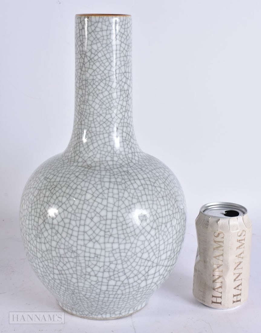 A CHINESE QING DYNASTY CRACKLE GLAZED GUAN TYPE BULBOUS VASE. 33 cm x 15 cm. (1 of 5)