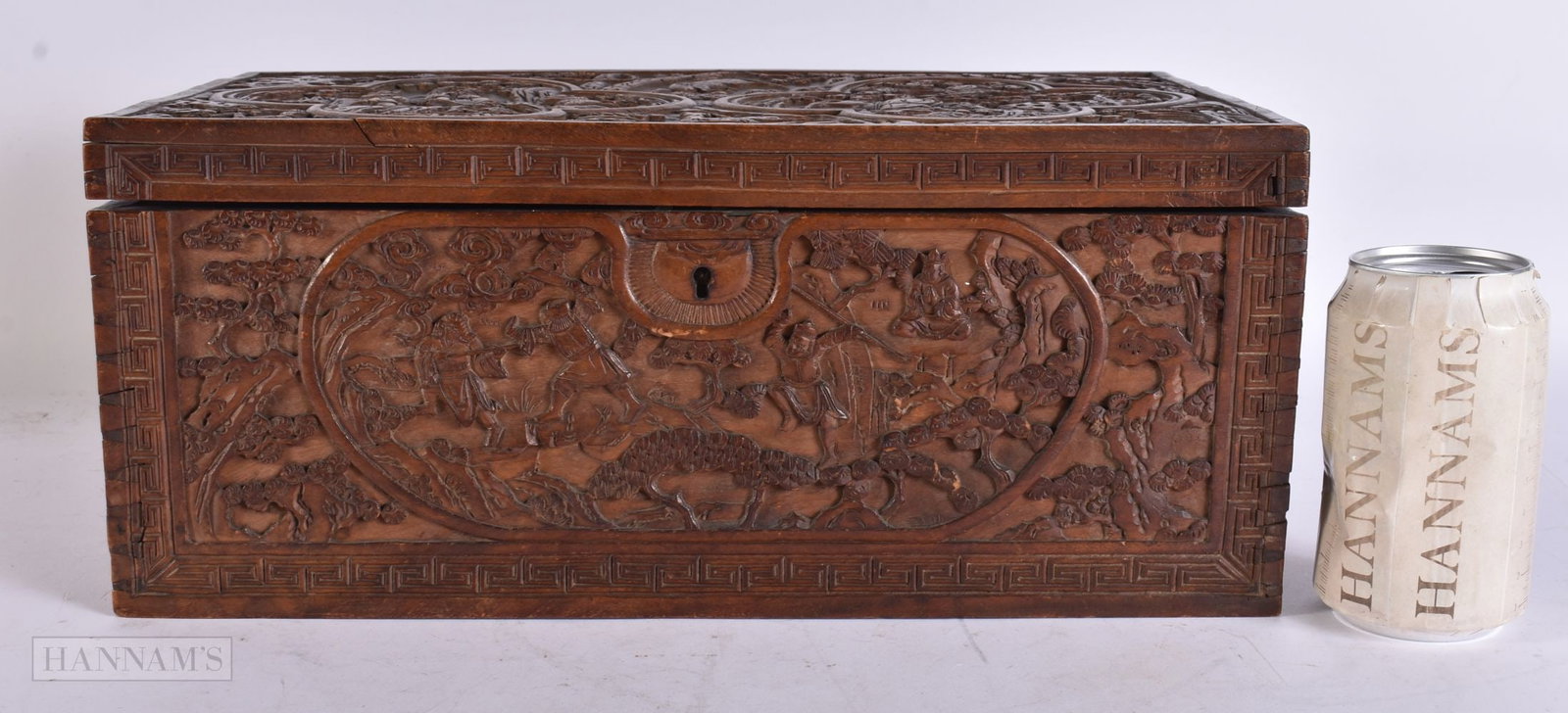 A LARGE CHINESE QING DYNASTY CARVED WOOD CASKET decorated in relief with figures, animals and landsc (1 of 17)