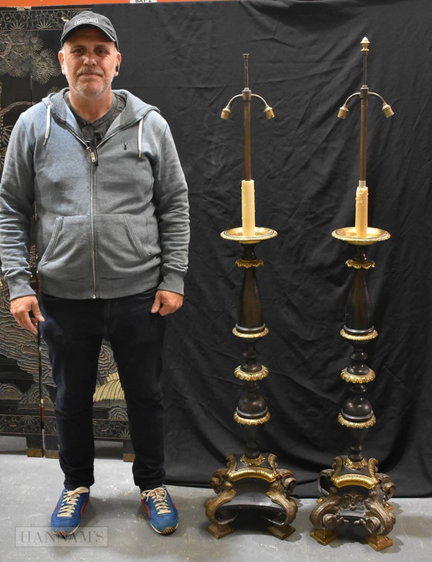 A LARGE PAIR OF EARLY 19TH CENTURY EUROPEAN CHATEAU BRONZE CANDLESTICKS. 161 cm x 30 cm.: A LARGE PAIR OF EARLY 19TH CENTURY EUROPEAN CHATEAU BRONZE CANDLESTICKS. 161 cm x 30 cm.