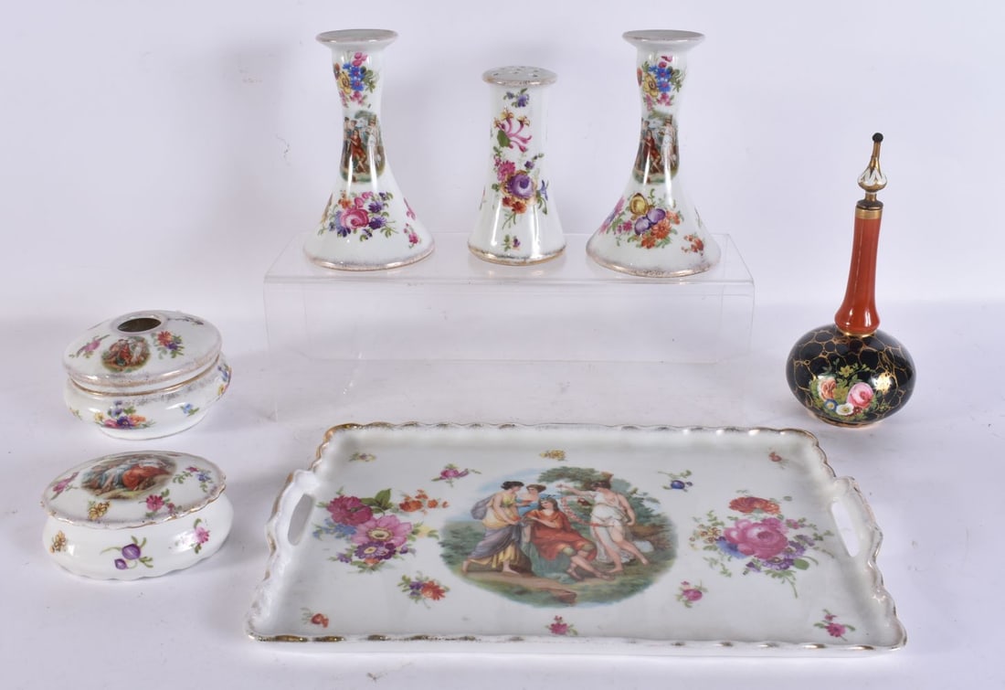 A CZECH PORCELAIN DRESSING TABLE SET together with a scent bottle. Largest 28 cm wide. (7) (1 of 6)