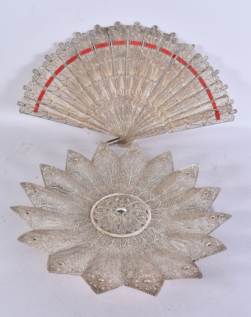 AN EASTERN WHITE METAL FILIGREE DISH and a white metal fan. 542 grams. 24 cm wide. (2) (1 of 5)