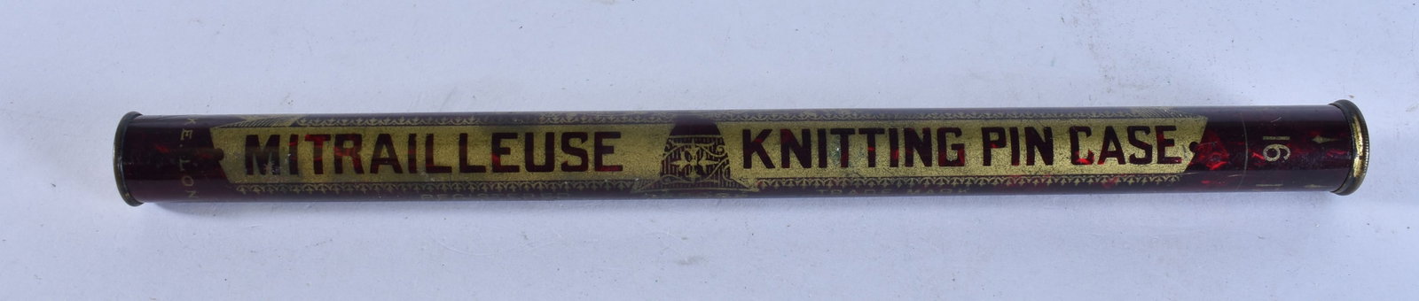 A VINTAGE TIN PLATE LITHOGRAPH NEEDLE CASE. 23 cm wide. (1 of 4)