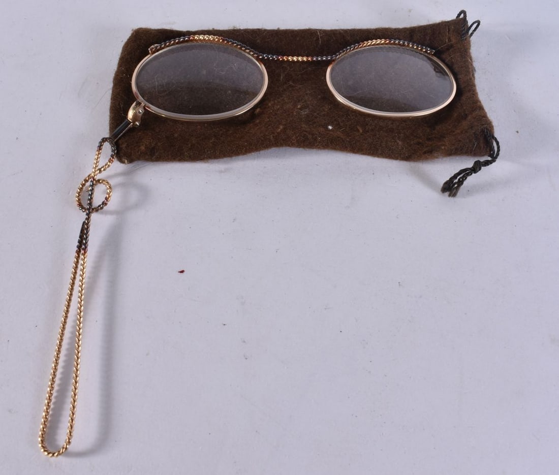 A PAIR OF BEADED YELLOW METAL LORGNETTES. 12 cm x 12 cm. (1 of 2)